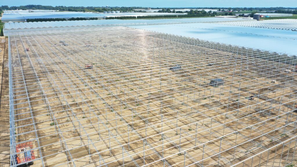 Aerial photo of framing being completed on H&A Farms 11-acre tomato greenhouse